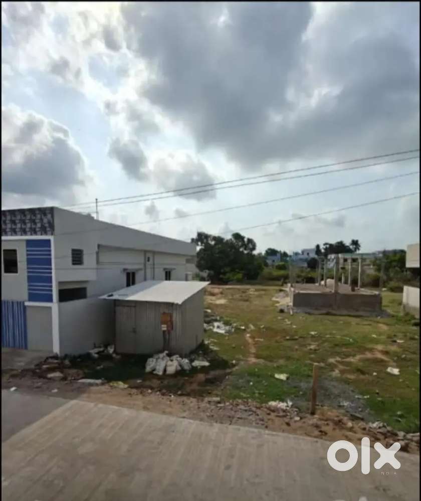 West facing site 27 X 56. Very neat to kovvada Center.V D O Colony