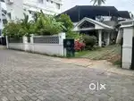Plot with old house for sale near Lisse hospital Ernakulam North.
