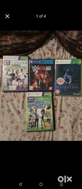Xbox games controller, kincet sensor and wwe video cds