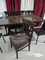 6 seaters wooden dining table with 4 chairs