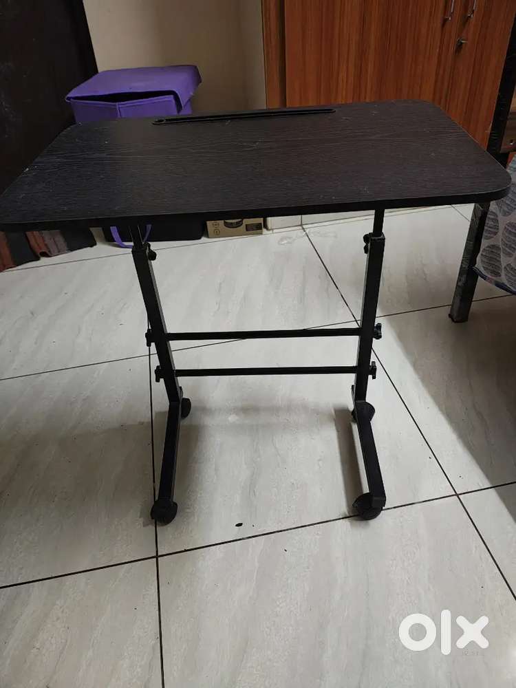 Multi purpose height adjustable laptop table