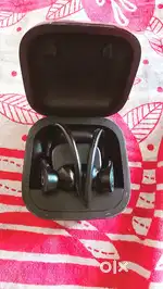 Flagship earphones of brand Pebble of worth 10k with lightening chargr