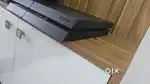 PS4 with 2 controllers & 13 CD's