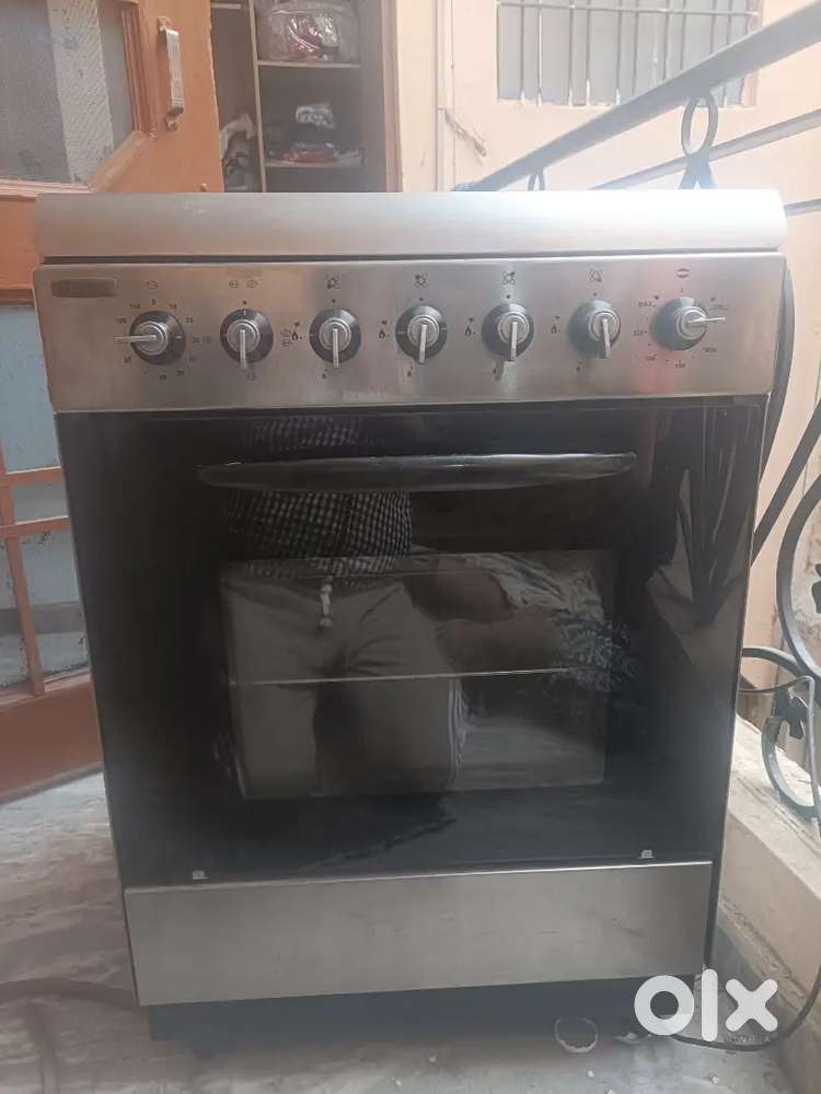 Faber heatkraft four burner cooktop with oven