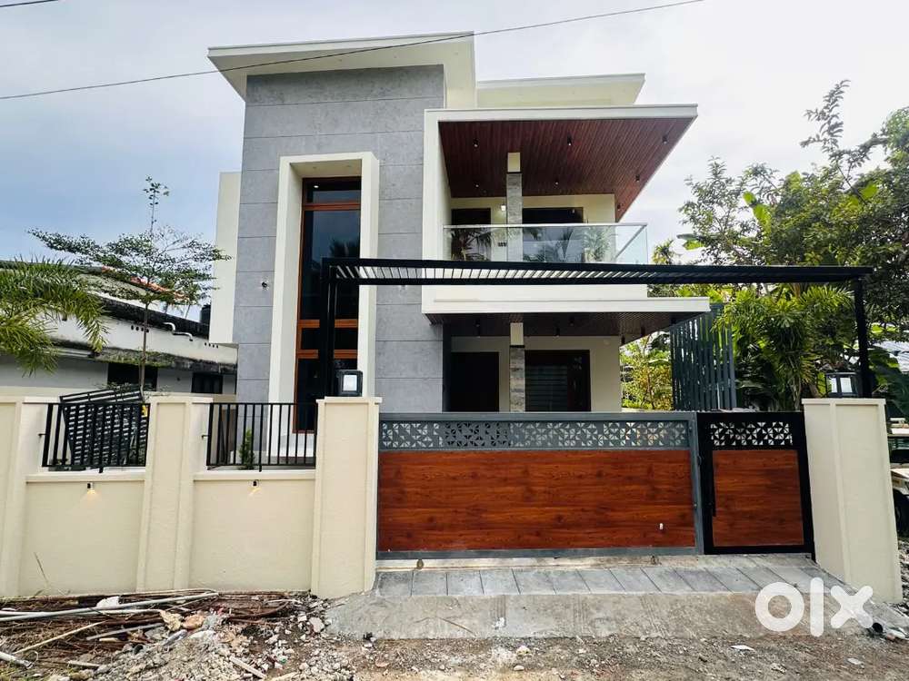 5.5 cent 2500 4 BHK architectural house Kakkanad Infopark 6km