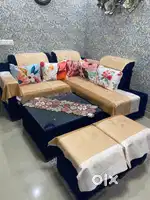 5seater L-shape sofa with center table and 2 puffs along with 5 cusion