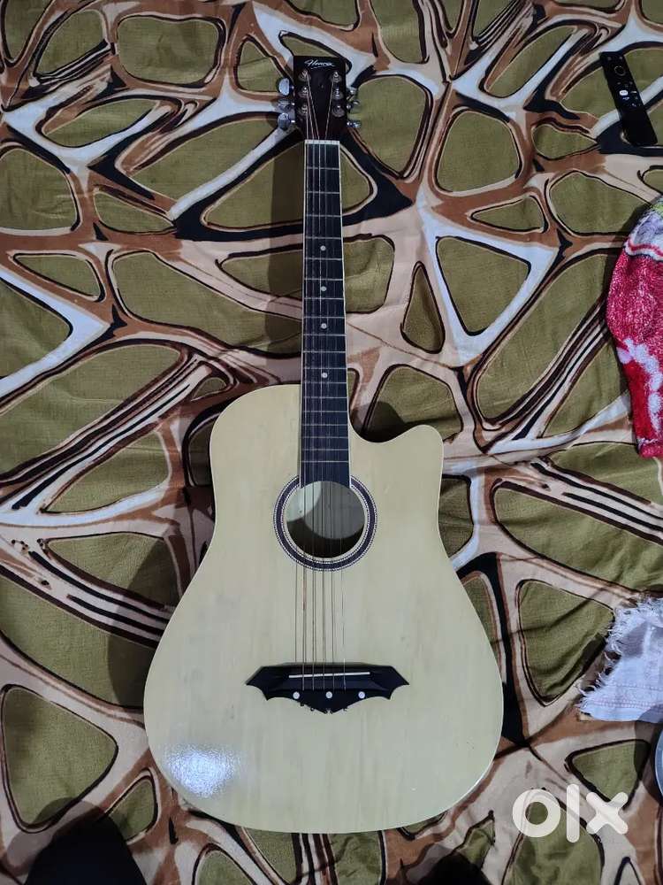 Semi acoustic guitar acoustic and electric both