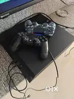 PS4 with 2 controllers and 14 games