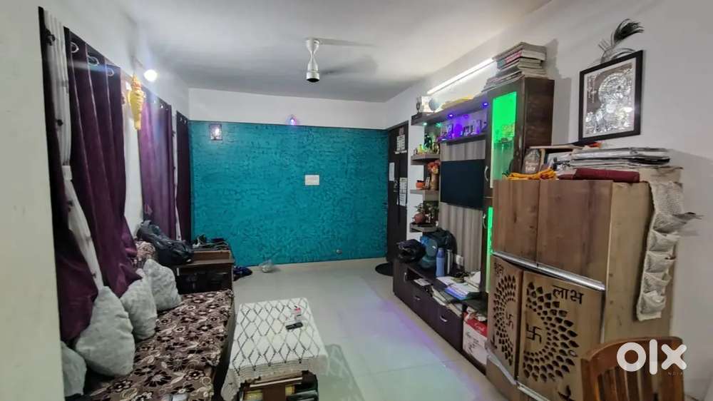 2 BHK Semifurnished, East facing flat with covered Car parking