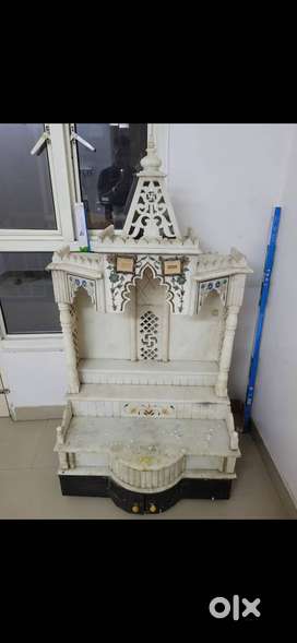 Marble temple with wooden storage