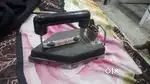 A heavy branded electric Iron press
