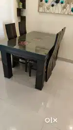 Dinning table 4 seater ,4 by 5 feet in dimensions