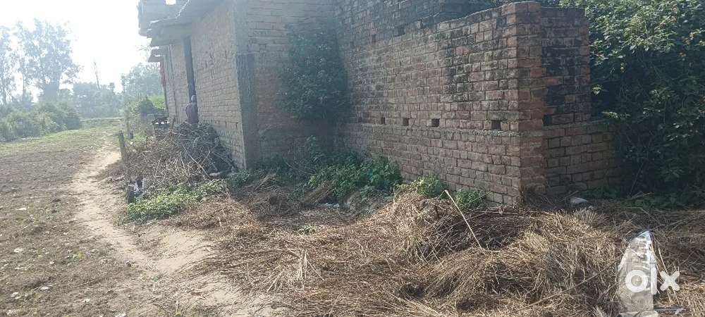 Land with half house