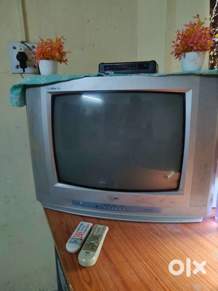 Tv LG with dish tv,fan Bajaj ,water bottle