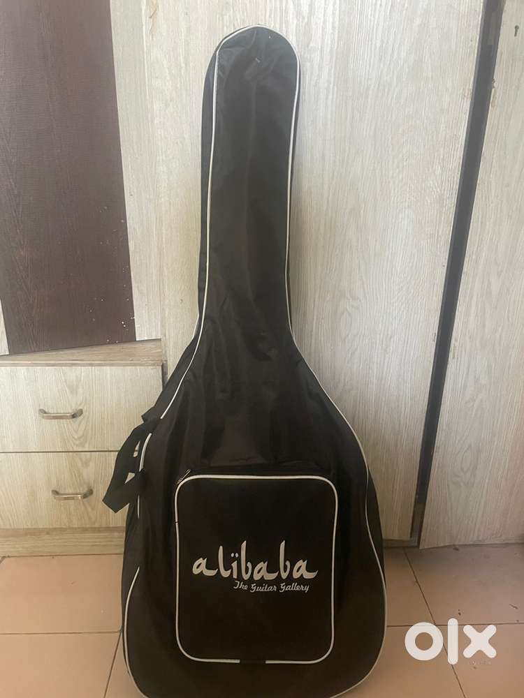 Proffesional guitar with bag aux port picks string extra