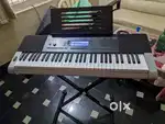 CASIO CTK-850IN 61-Key Piano - Like New + Stand & Book