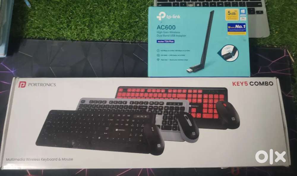 Wi fi dongle tp link ; Blutooth keyboard and mouse ; both with boxes .