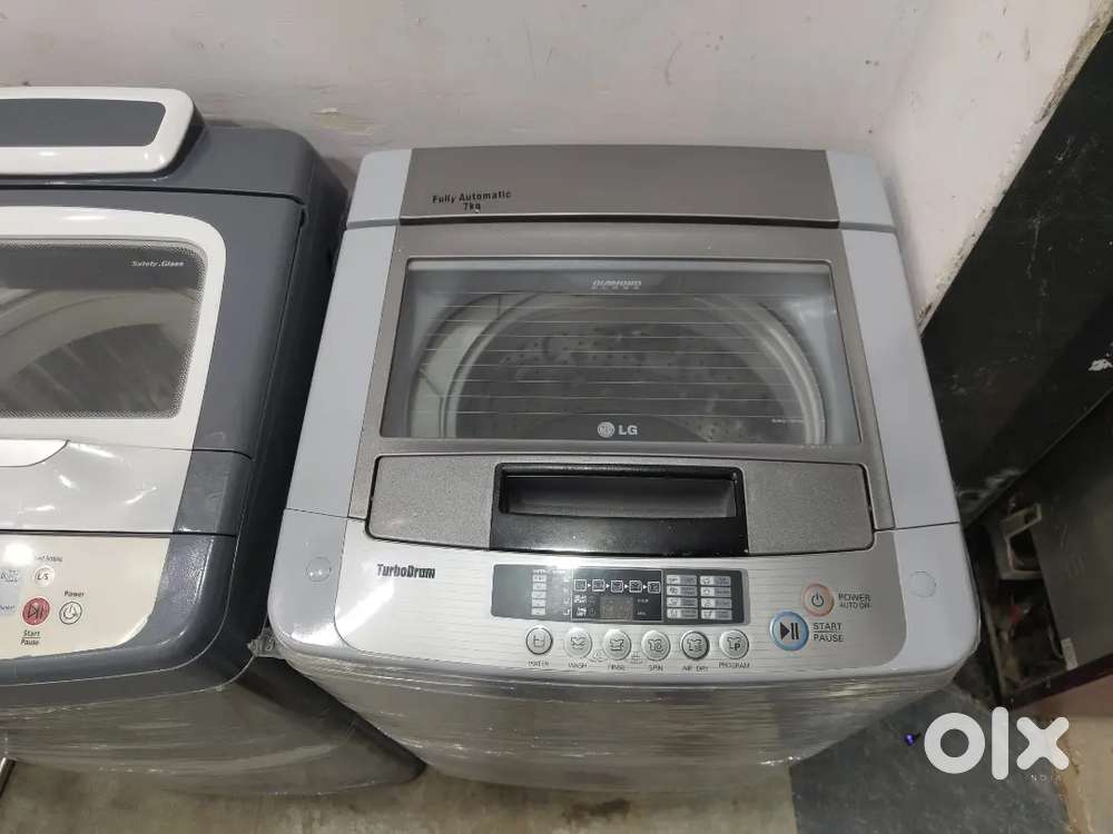 LG washing machine fully automatic top load with warranty 1 year old