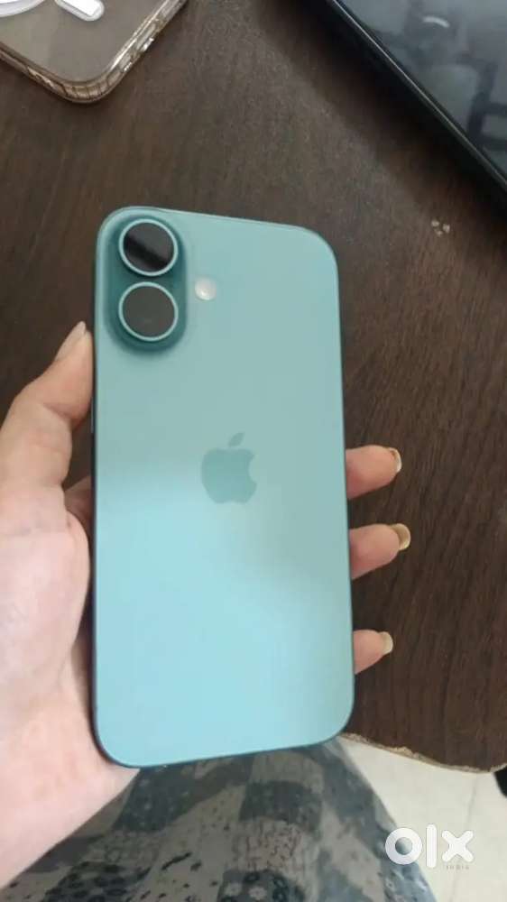 Selling my 4 months old I phone 16 in green colour/.Need urgent money
