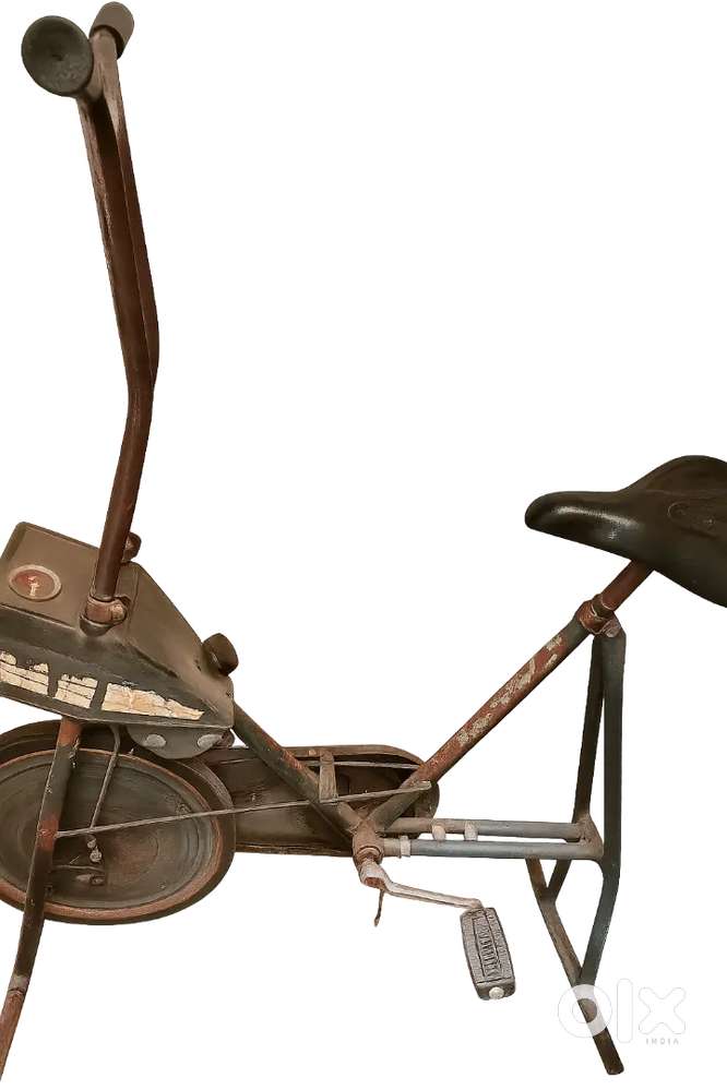 Gym cycle with adjustable weight push