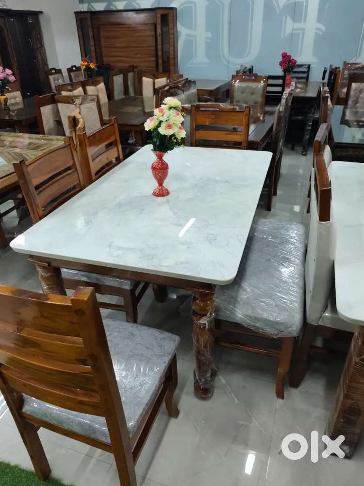 Marble dinning dinning table available in starf dream furniture