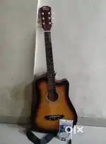 Guitar with bag and guitar strings
