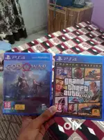 Gta 5 cd and god of war cd for ps 4