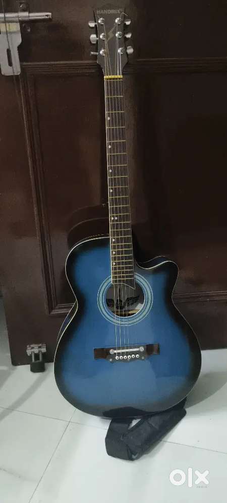 Handrix blue Guitar for sale with bag capo and picks