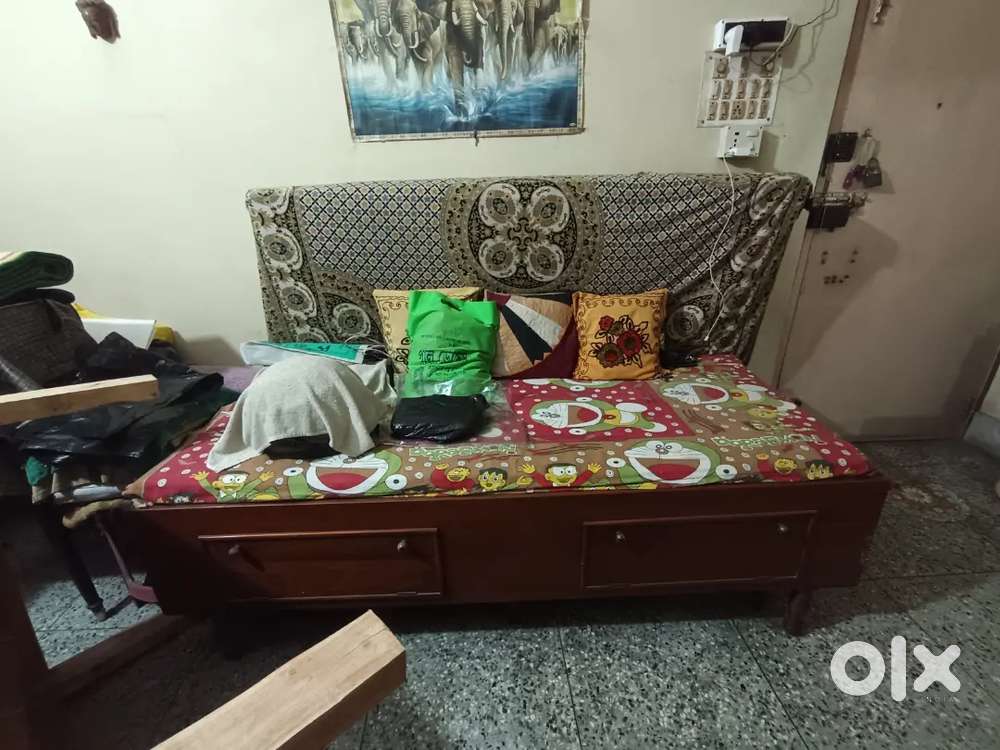 A good condition sofa cum bed (segun wood)