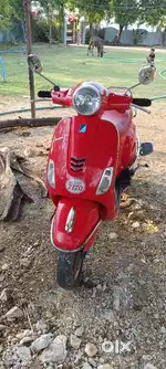 Red vespa with best mileage and conditions