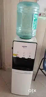 Water dispenser with mini fridge