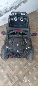 Black car for child under 5 years in good condition and chargable