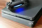 PS4 Slim 1TB with Uncharted Series (1 to 4) – Excellent Condition
