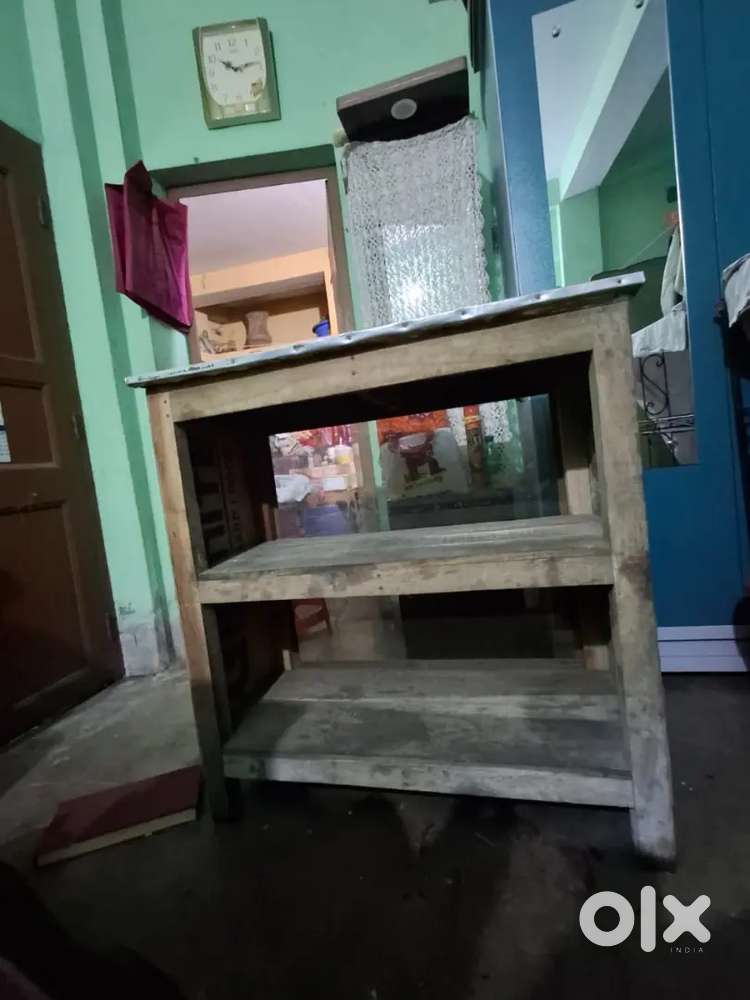 Table with one side glass