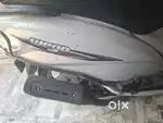 Very good  condition..White colour. Working scooty