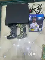 Sony play station 4 slim 1TB console with two dualshock controllers cd