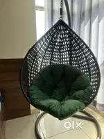 Big oval swing with cushions