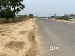Plot near airport on highway