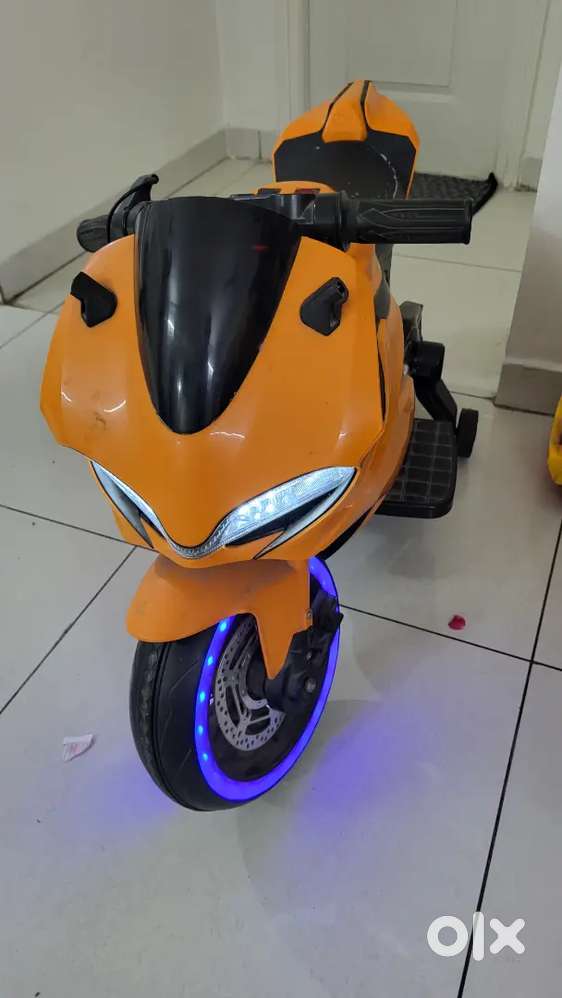 Kids Bike Electric with Music - Two kids capacity.