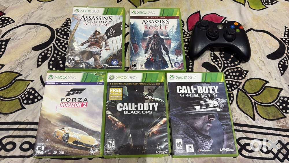 Xbox 360 slim and 5 games (negotiable)