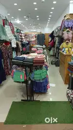 Ready made shop sales girl with cashier