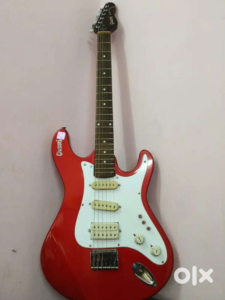 RED ELECTRIC GUITAR