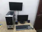 Computer screen with cup also mouse speaker