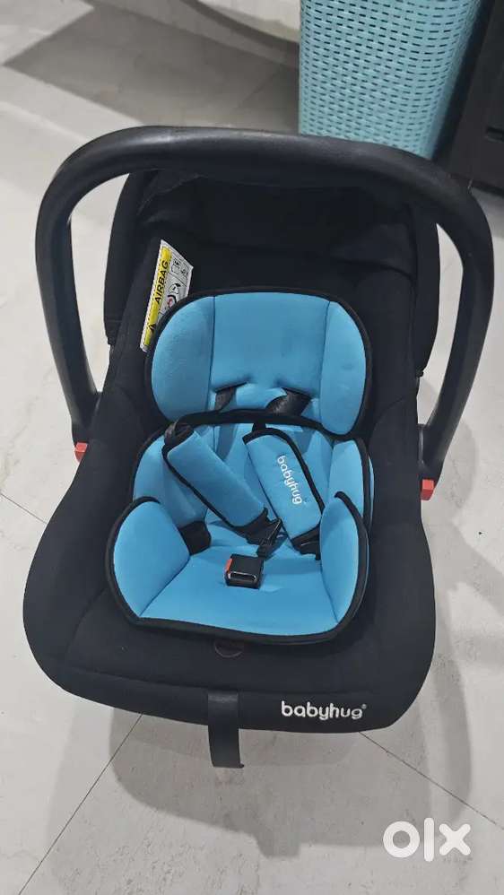 Selling Babyhug
Car Seat Cum Carry Cot  and R Rabbit Cuddle bag