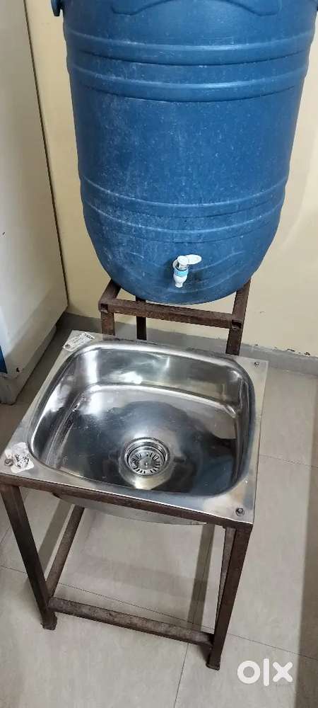 Kitchen basin and tank with attach tap