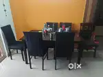Six sitter dinning table with chairs