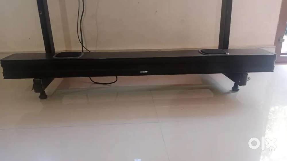 A sound bar with attached two sound bar with aux cable