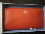 Hidesign womens wallet (Orange Colour) with price tag Box piece