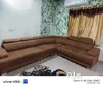 Corner sofa.  Good condition  cover sathe