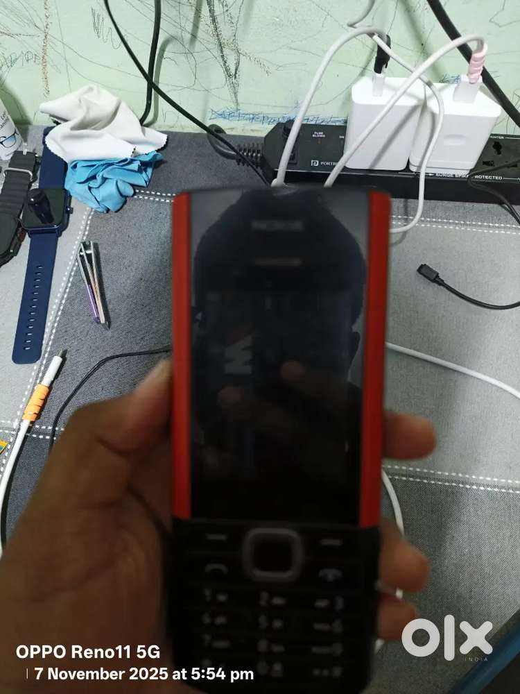Nokia 5710 phone with built  in earbuds